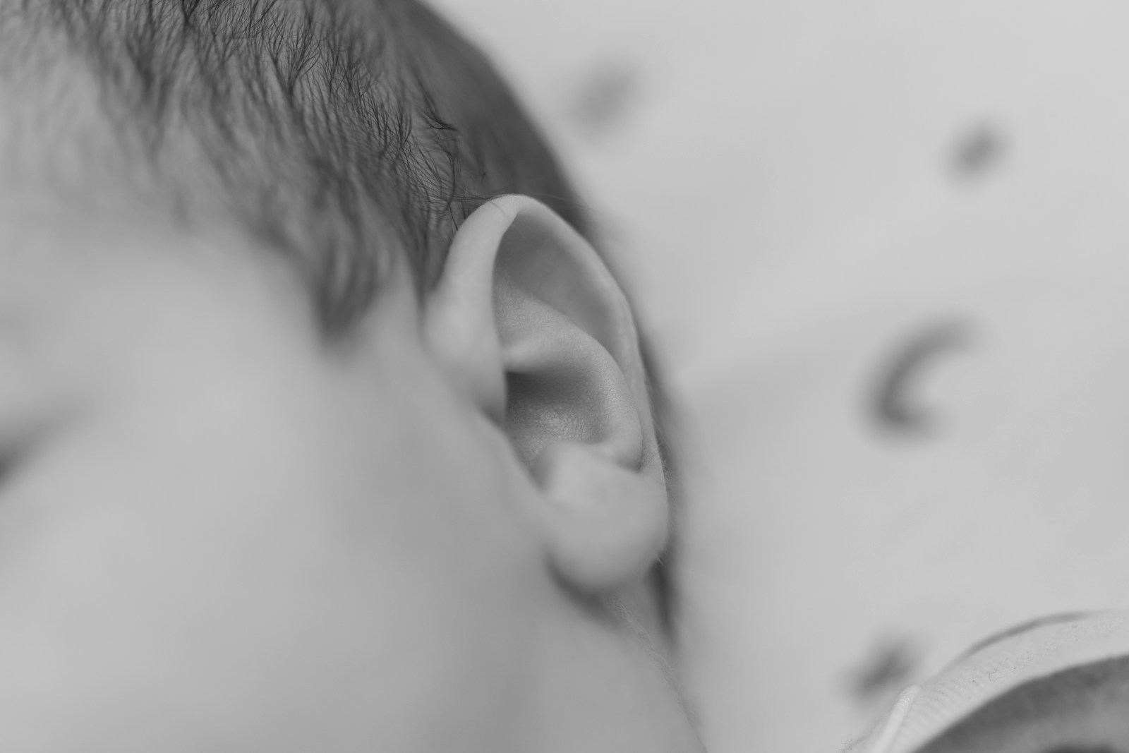 a close up of a baby's ear