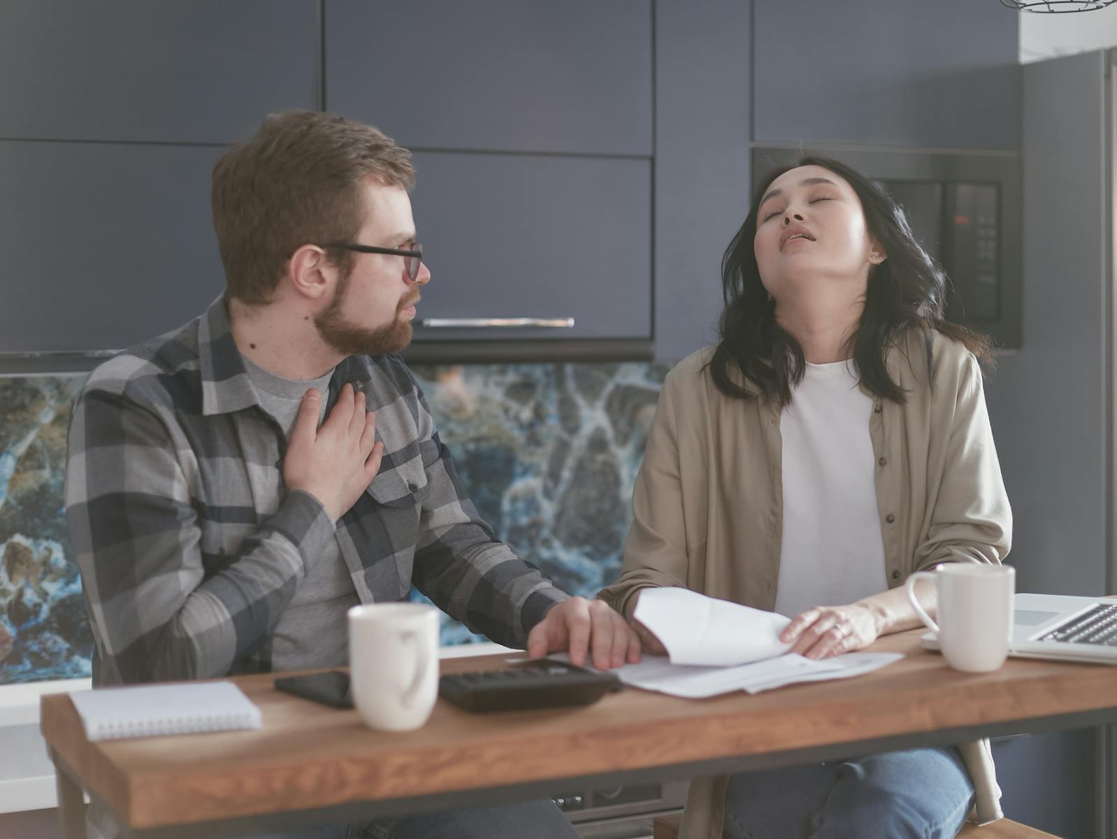 Stressed Couple Explaining Things to each Other