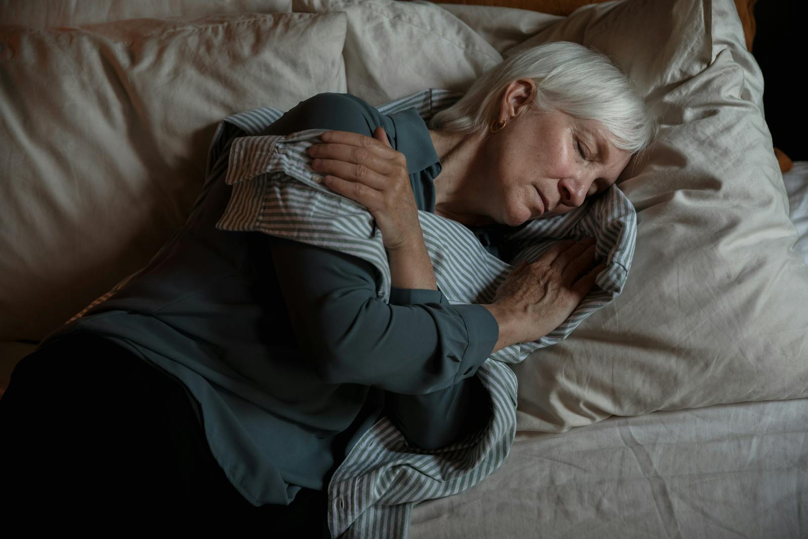 An Elderly Woman Lying on the Bed