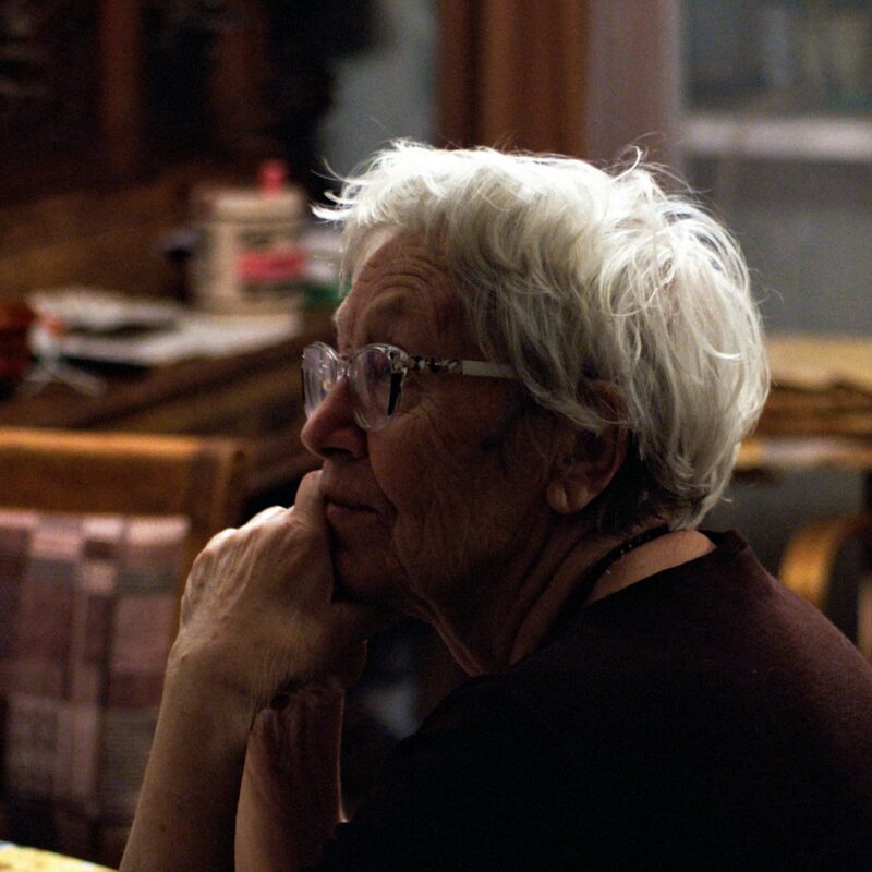 woman in black shirt wearing eyeglasses